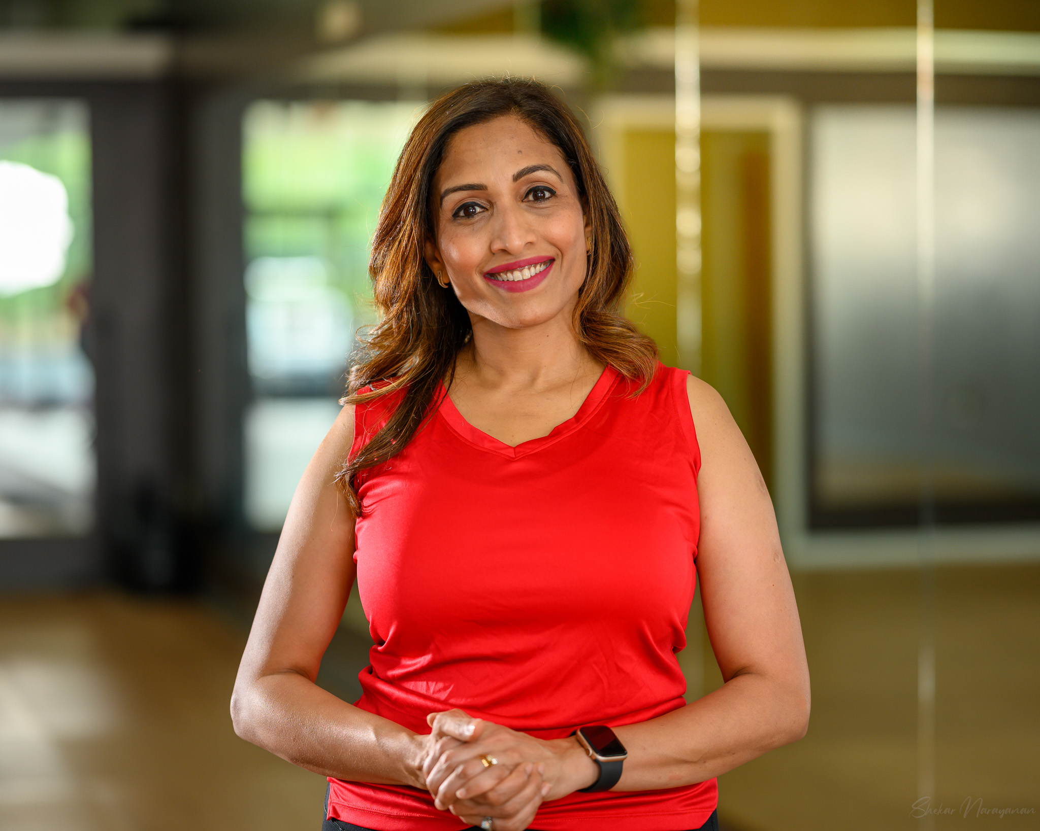 Uma Murlidhar in a red top, portrait from Planet U Performing Arts for the Just Koothu 2026 judging panel.